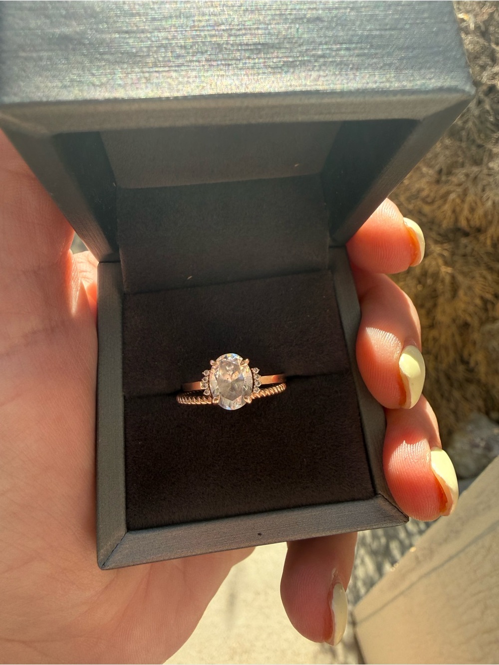Rose Gold Oval Solitaire Ring with Halo Accent